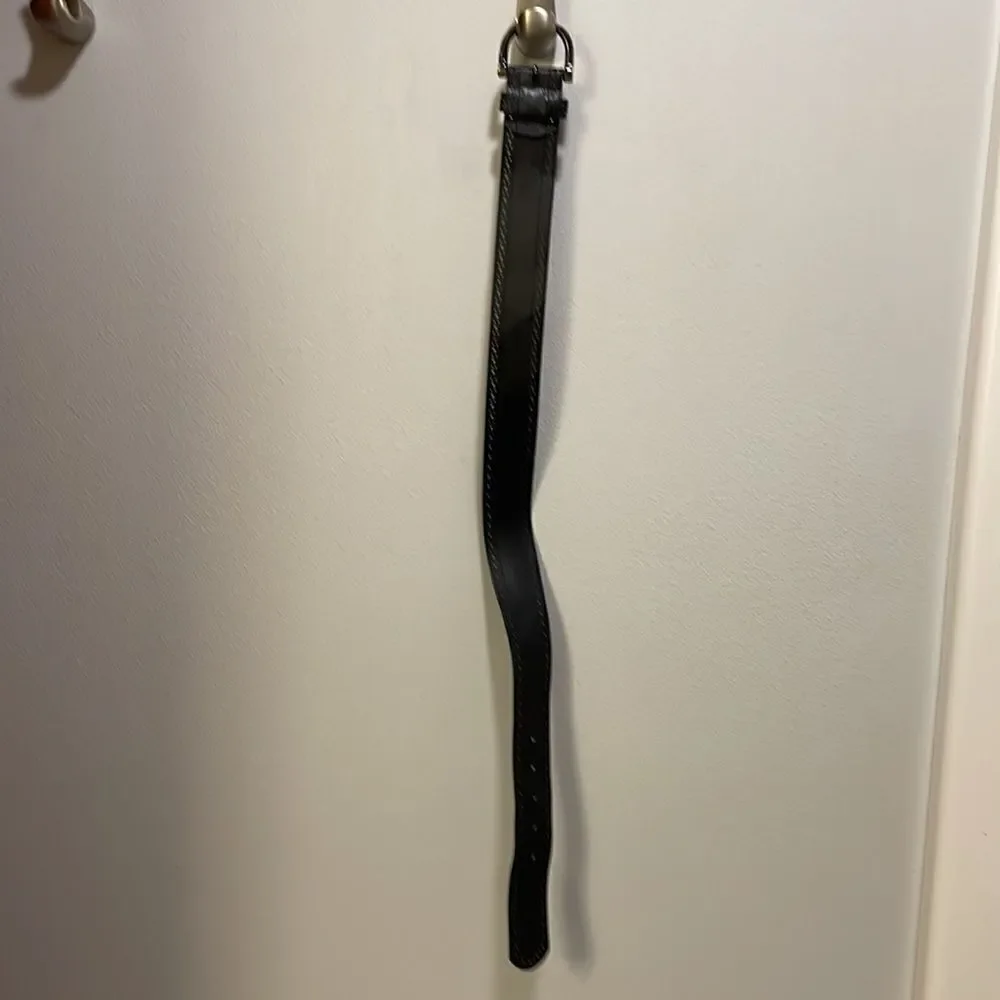 Woman’s black leather belt